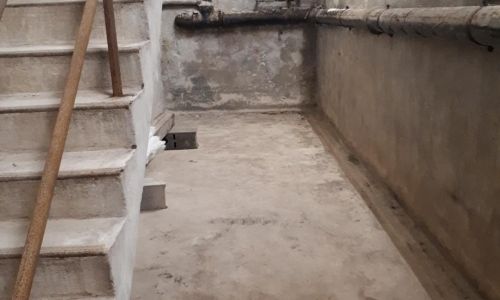 ENTRETIEN DANS LA CAVE DE L'EGLISE